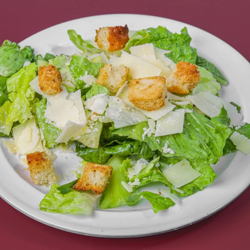 Caesar salad with croutons and shaved Parmigiano